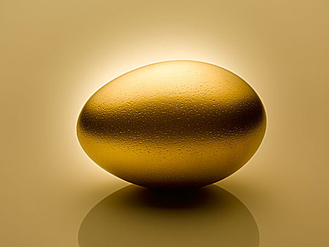 金蛋,金色背景,静物