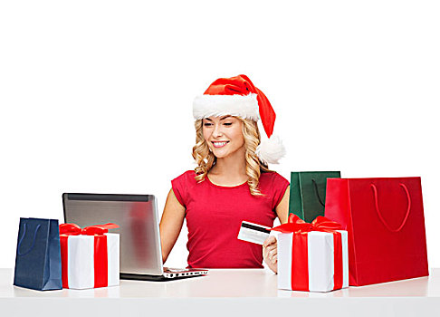 圣诞节,圣诞,网上购物,概念,女人,圣诞老人,帽子,礼盒,包,笔记本电脑,信用卡