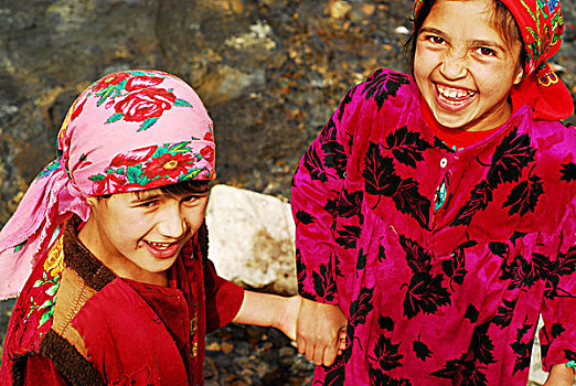 tajikistan,penjakent,group,of,boys,and,girls,by,the,river