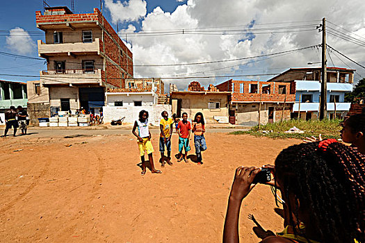 brazil,bahia,salvador,children,learning,to,take,photographs,during,art,in,all,of,us,activity,favela