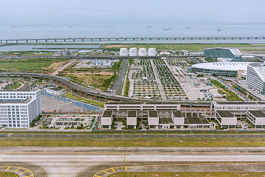 航拍深圳宝安机场建筑和广深沿江高速大桥