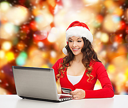 圣诞节,休假,科技,购物,概念,微笑,女人,圣诞老人,帽子,信用卡,笔记本电脑,上方,红灯,背景