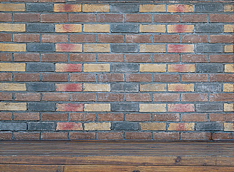装饰砖墙和木地板adecoratedbrickwallandwoodenfloor