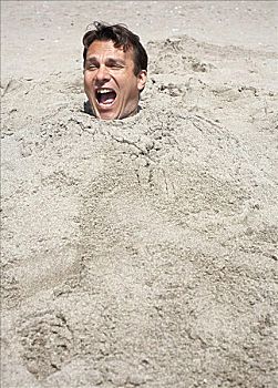 男人,掩埋,沙子,海滩