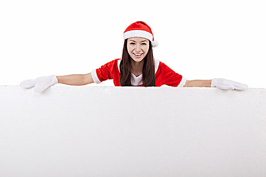 穿圣诞装的青年女子和巨大的白板