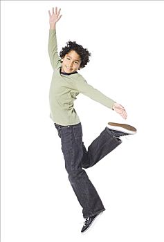 男孩,8-9岁,跳跃,白色背景