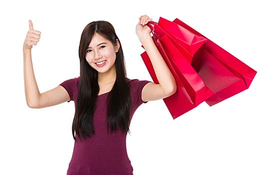 年轻,亚洲女性,拿着,购物袋,竖大拇指,手势
