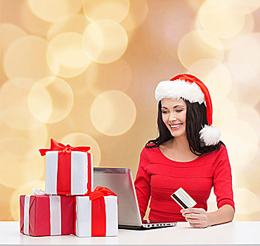 圣诞节,购物,人,概念,微笑,女人,圣诞老人,帽子,礼盒,笔记本电脑,信用卡,上方,米色,背景