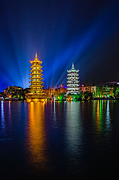 不同背景灯光下的桂林日月双塔夜景