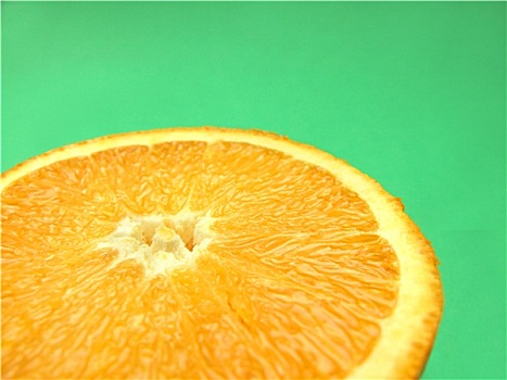 橘子片,微距,绿色背景