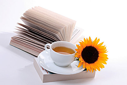 茶杯,书本,向日葵