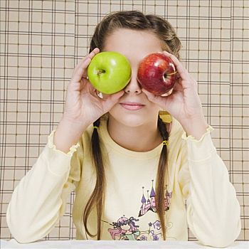 特写,女孩,拿着,苹果,上方,眼睛
