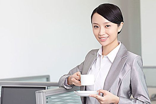 商務(wù)女士喝咖啡