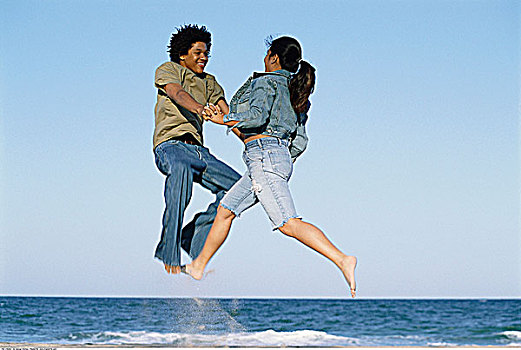 伴侣,跳跃,海滩