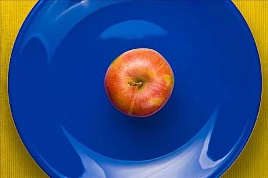 苹果,蓝色背景,盘子