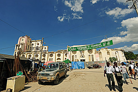 haiti,port,au,prince,people,walking,in,front,of,our,lady,the,assumption,cathedral,destroyed,and,ruin,after,earthquake