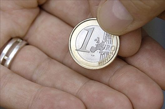 1欧元,硬币,手