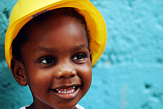 dominica,roseau,preschool,ccf,portrait,of,young,girl,with,a,construction,worker,hat