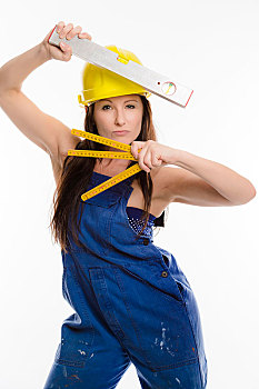 女人,穿,蓝色,工作服,安全帽,拿着,折叠,尺子,水平仪