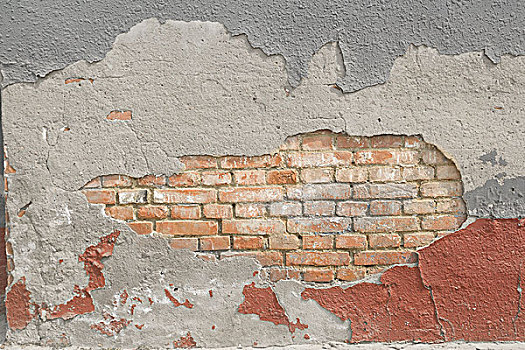 涂层脱落的砖墙abrickwallwithcoatingpartlydropped