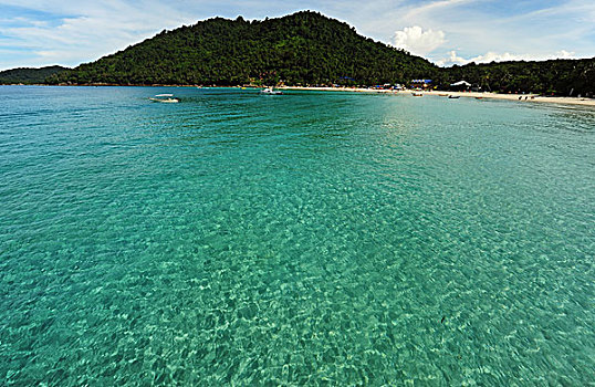 malaysia,perhentian,islands,kecil,turquoise,water,with,green,forest,hill,in,the,back