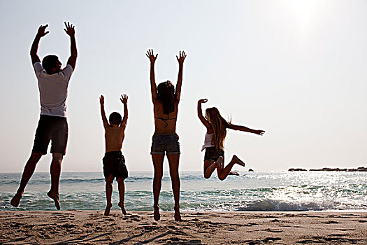 家庭,跳跃,空中,海滩