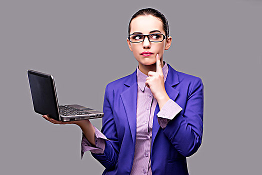 职业女性,笔记本电脑,灰色背景