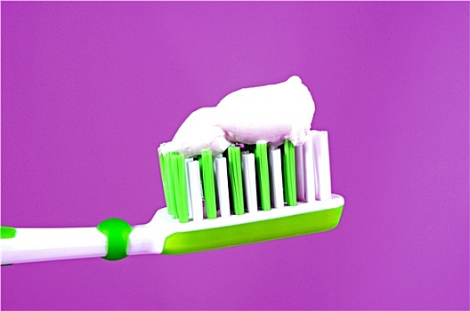 绿色,白色,牙刷,牙膏,粉色背景