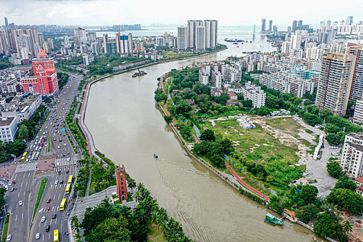 航拍海南海口海甸河畔的海口钟楼