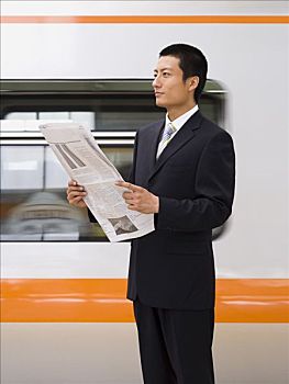 商务人士,读报,地铁,背景