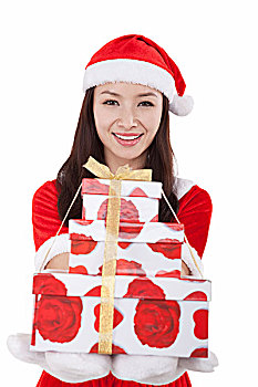 穿圣诞装的青年女子拿着礼物