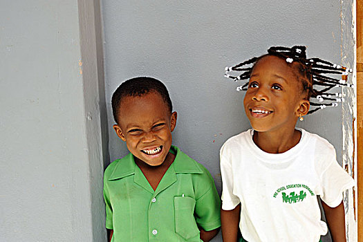 dominica,roseau,preschool,social,center,portrait,of,young,girl,and,boy