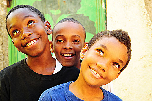 haiti,port,au,prince,portrait,of,3,smiling,black,boys