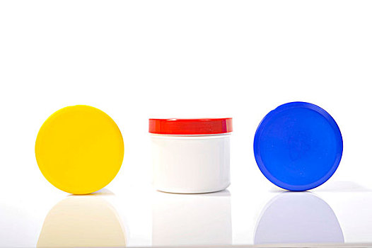 白色,圆,塑料盒,红色,蓝色,黄色,帽