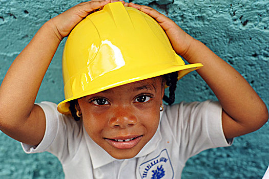 dominica,roseau,preschool,ccf,portrait,of,young,girl,with,a,construction,worker,hat