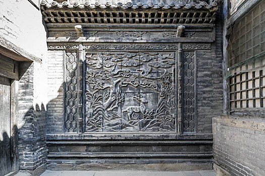 山西太谷曹家大院,三多堂,内的古建筑砖雕墙