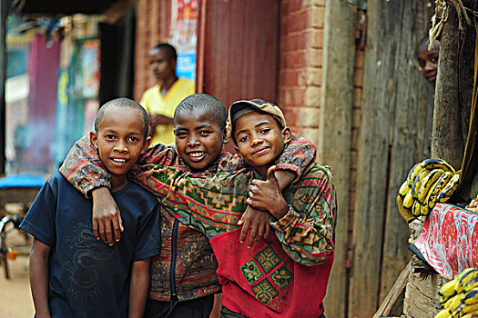 madagascar,ambalavao,3,african,boys,hugging,and,smiling