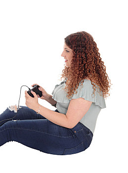 坐,女人,地板,玩,电子游戏