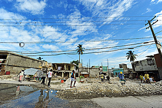haiti,port,au,prince,street,with,contaminated,puddle