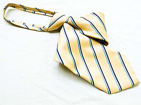 卷起,条纹,黄色,蓝色,领带,隔绝,白色背景